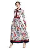 Robe plissée ample élégante à manches longues et imprimé floral