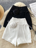 Short d'été avec décoration rose