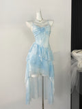 Robe d'été bleue vaporeuse à volants superposés