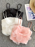 Top caraco sans manches superposé en organza fleuri